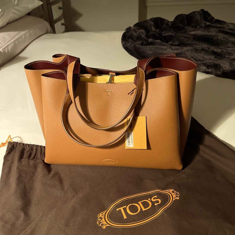 Brand NWT, Tod’s Bag, Medium Size, $1,545 retail, Brown with burgundy interior